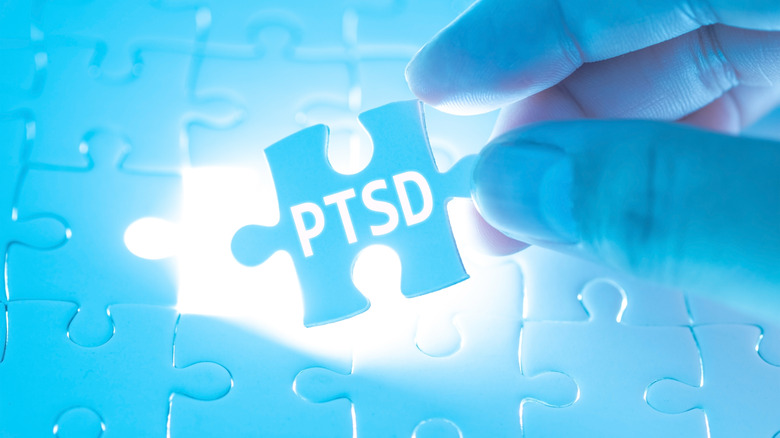 PTSD on blue puzzle piece