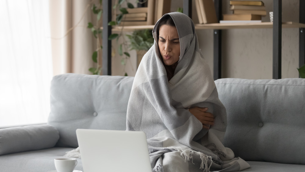 woman wrapped in blanket