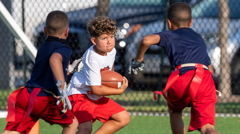 Boys playing flag football