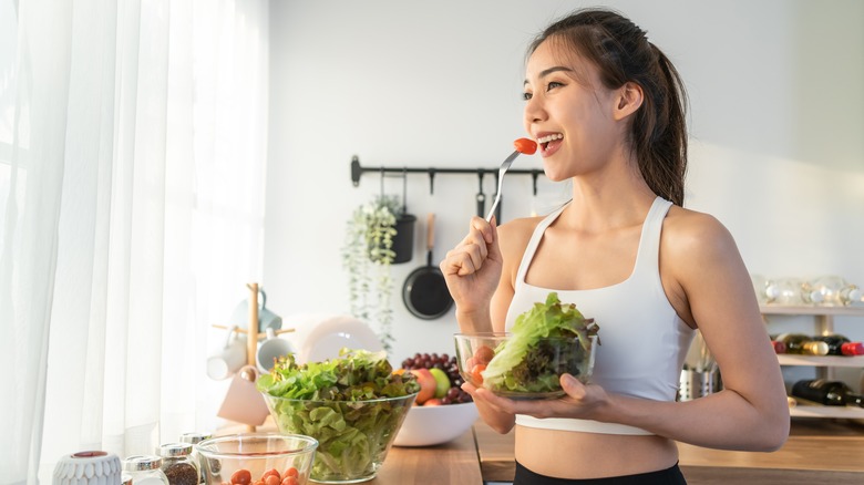 woman eating a salad