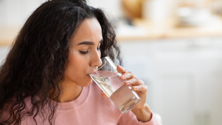 person drinking water