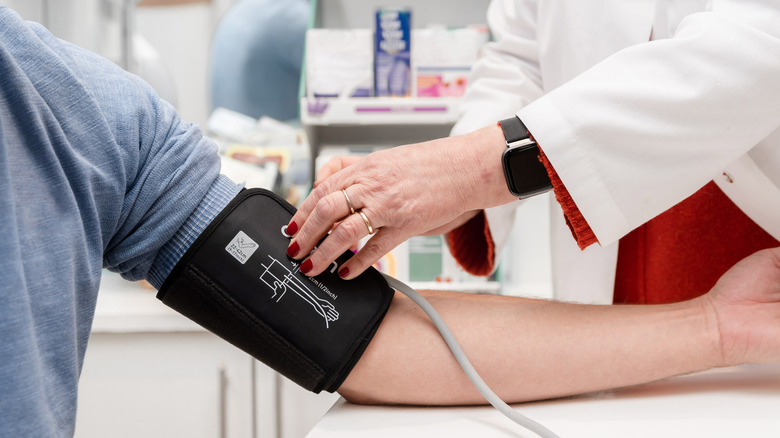 patient getting a blood pressure reading