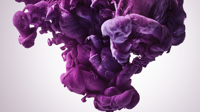 purple paint in water