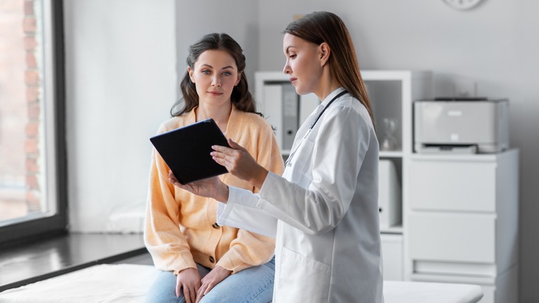 doctor consulting with patient