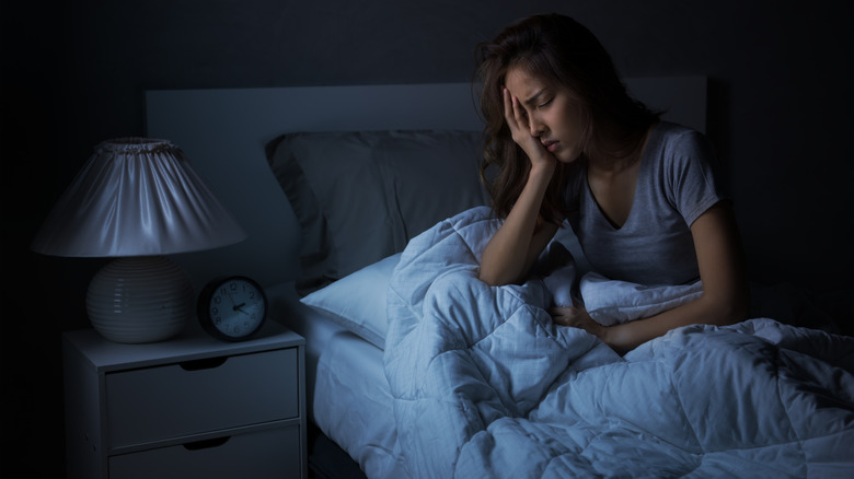 woman feeling depressed at night