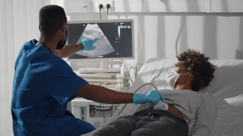 A pregnant woman gets an ultrasound