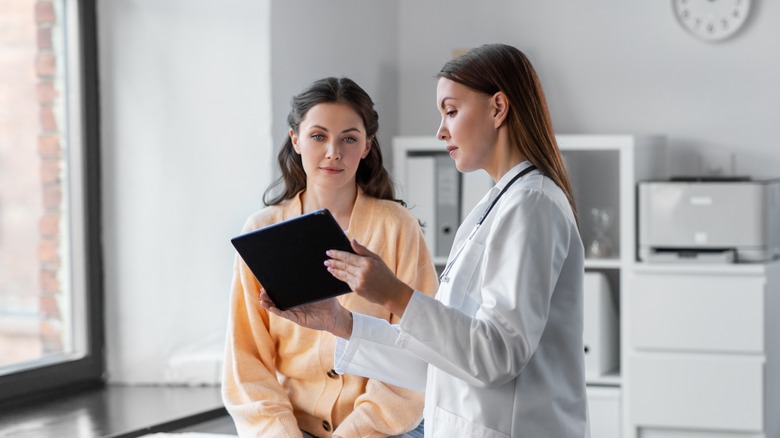 woman consulting with doctor
