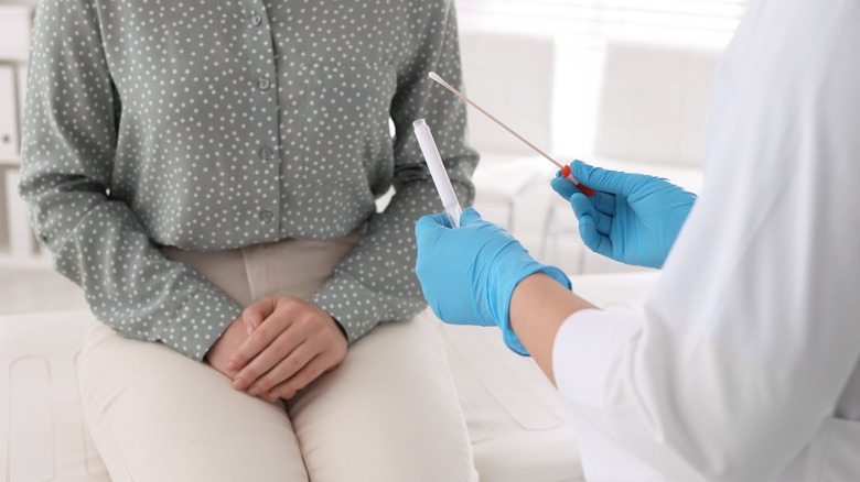Doctor and patient with gonorrhea