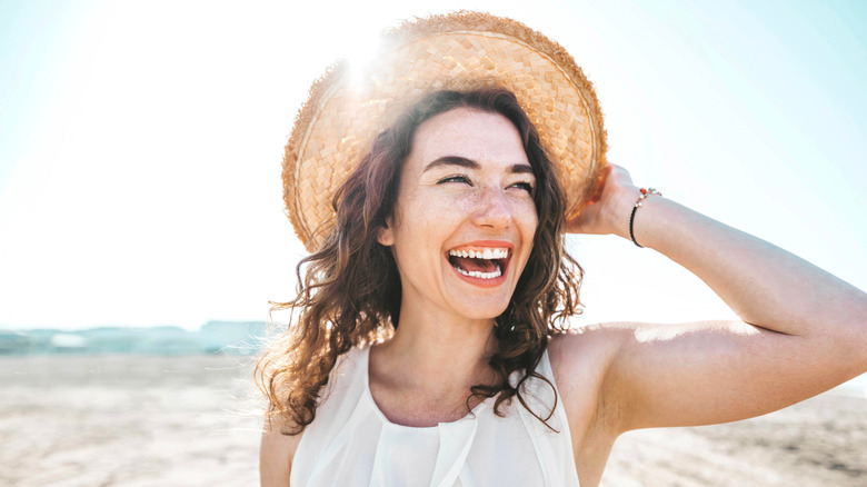 woman wearing a hat outdoors