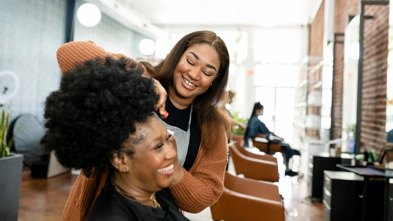 Person getting her hair done