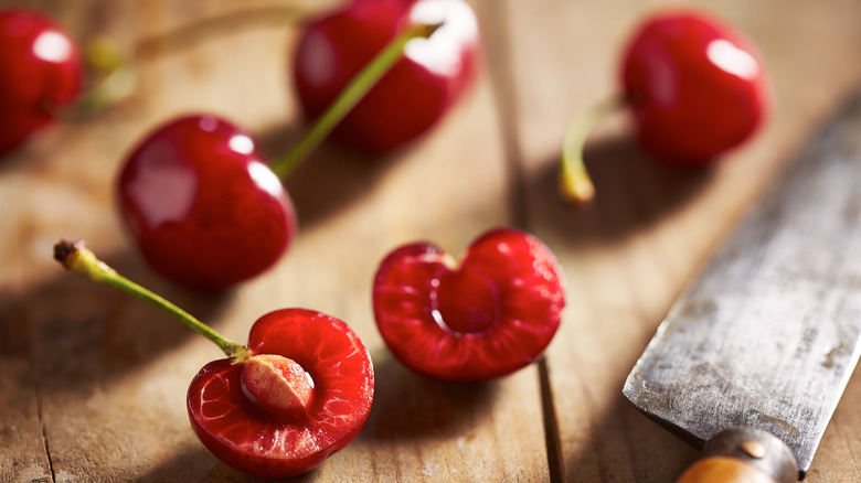 Cherry sliced in half with pit