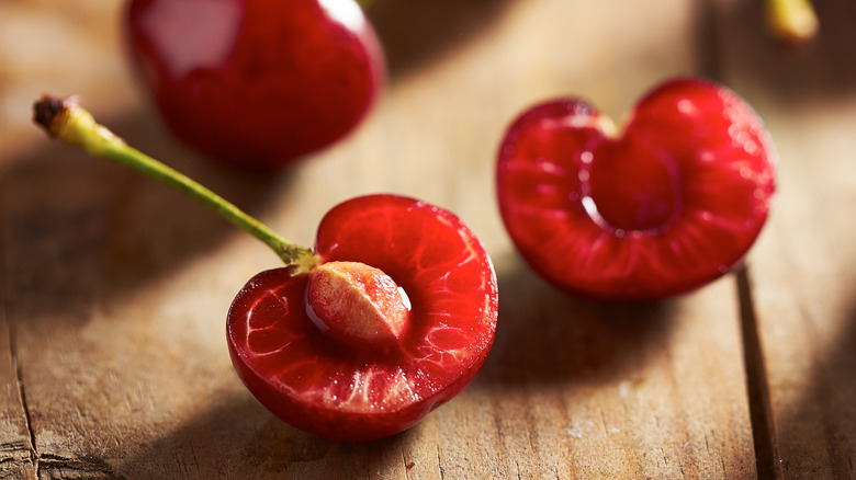 Cherry sliced in half with pit