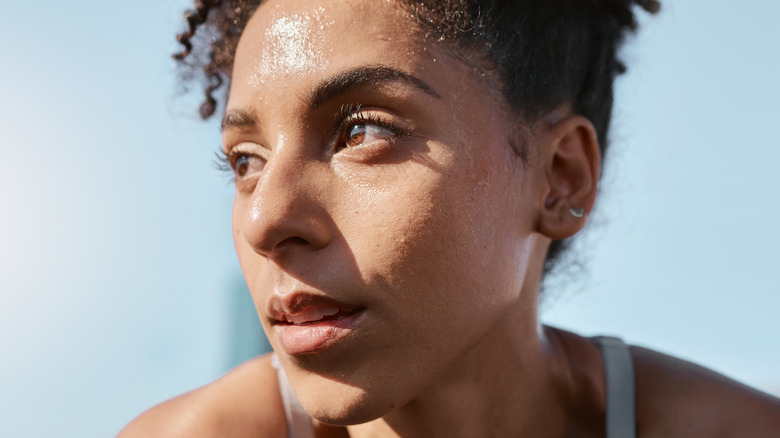 Woman breaking a sweat while exercising