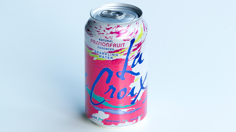 can of lacroix on blue background