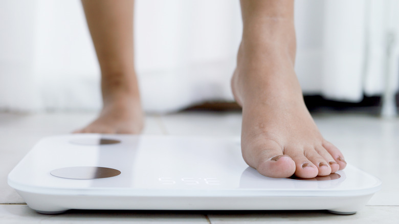 Feet on digital scale