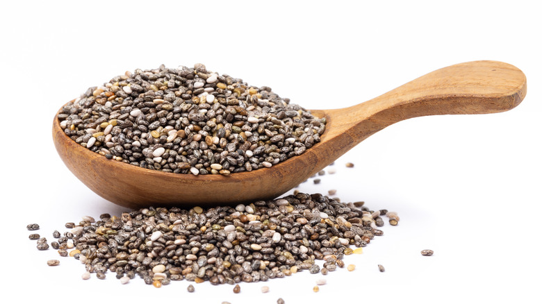 chia seeds on wooden spoon