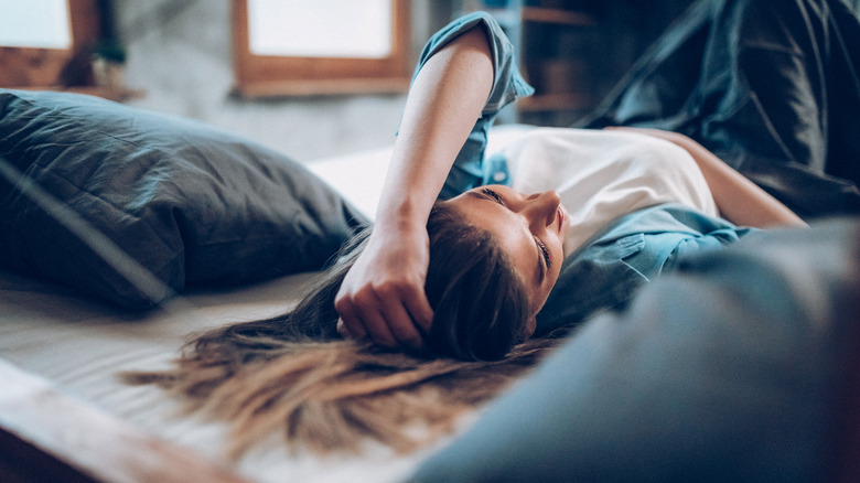 Woman awake in bed