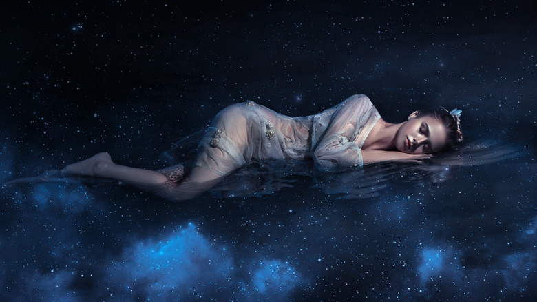woman sleeping in night sky