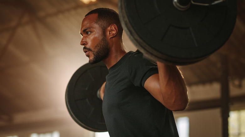 men lifting weights
