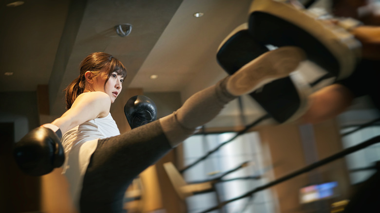Woman at kickboxing class