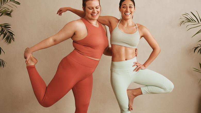 Two women wear leggings