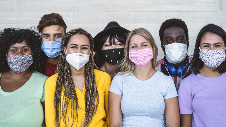 young people wearing masks