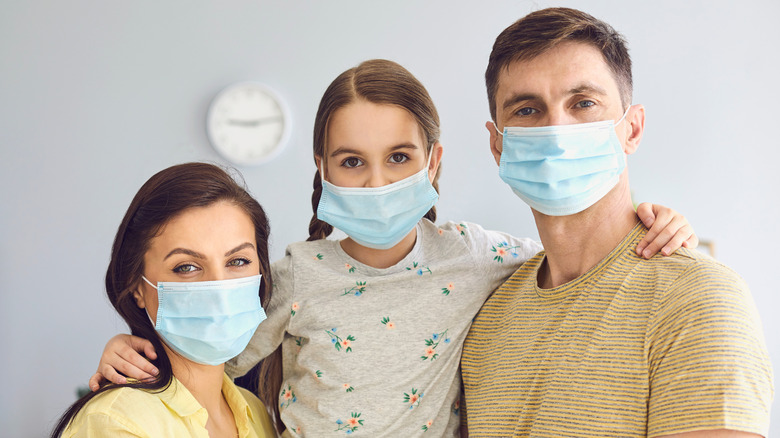 Family wearing face masks