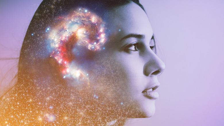 Starry galaxy in woman's mind