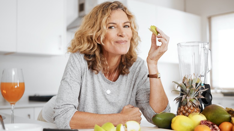 woman eating fruit