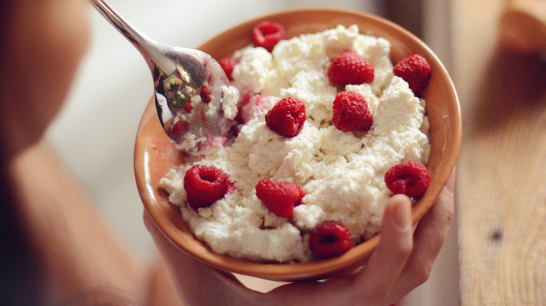 view from above of woman eating cottage cheese