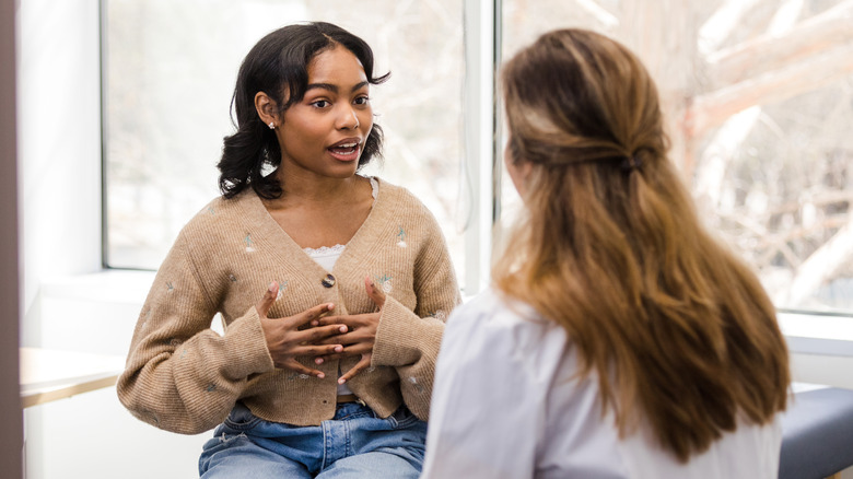 woman talking to her doctor