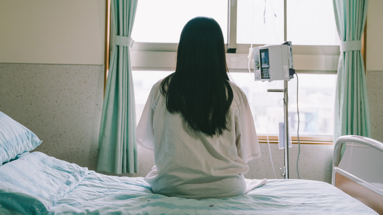 woman in hospital bed