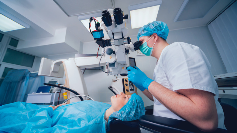A doctor performs LASIK surgery