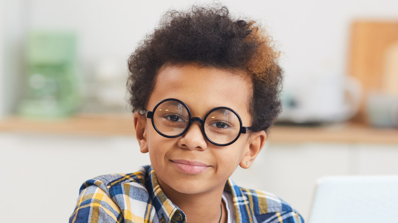 Child wearing glasses