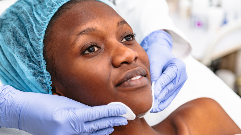 Woman getting chemical peel