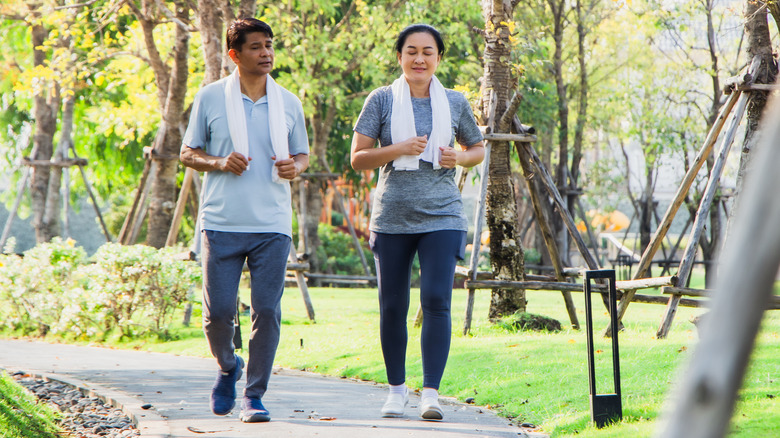 couple walking in park