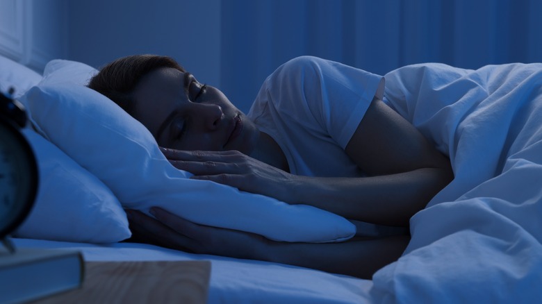 woman sleeping in bed