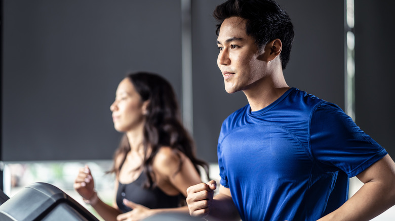 A man runs on the treadmill