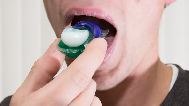child putting laundry pod in mouth