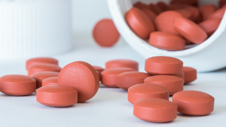 Ibuprofen tablets falling out of bottle