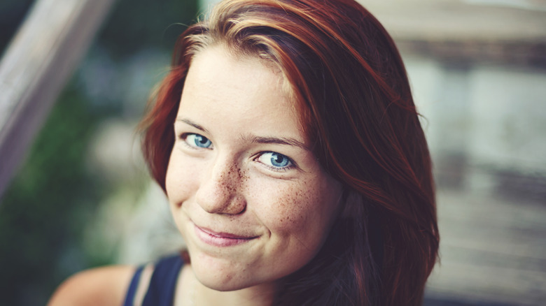 Red-haired woman with blue eyes