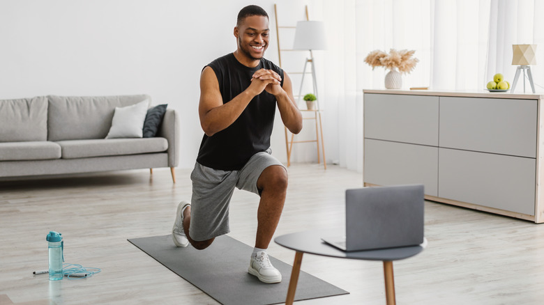 man stretching before workout 