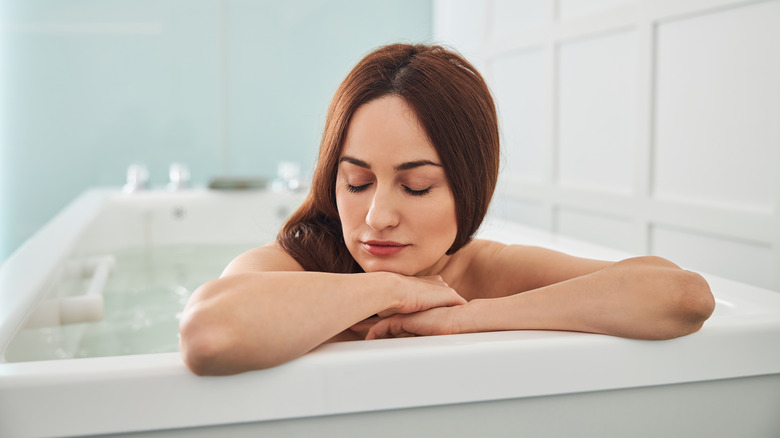 woman relaxing in bath