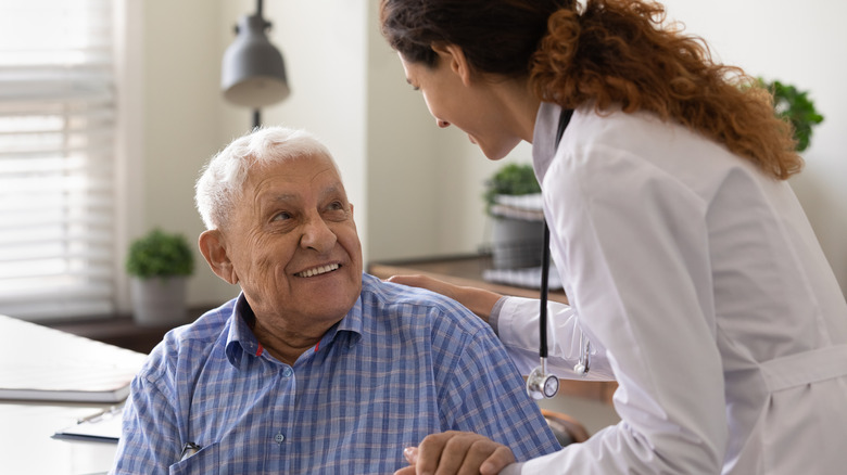 older patient and doctor