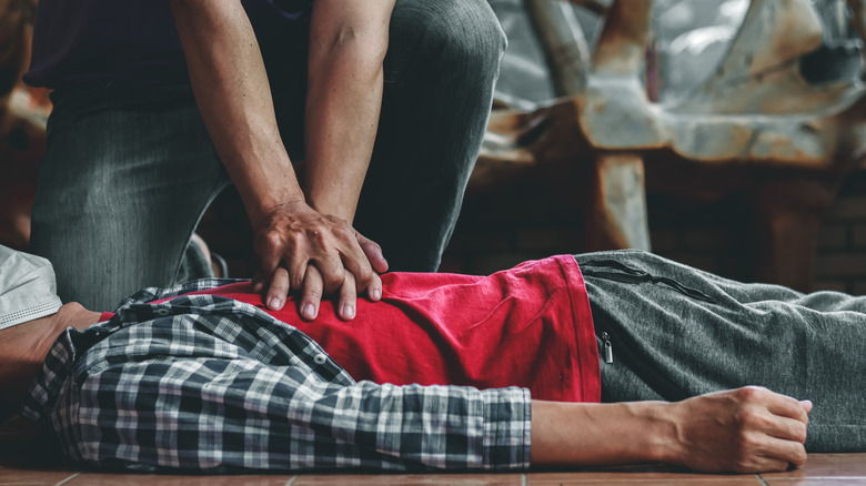 Person performing CPR