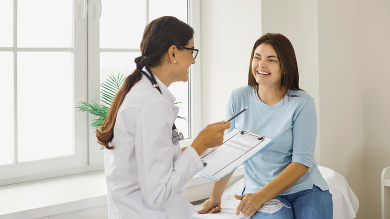 A woman visits a doctor