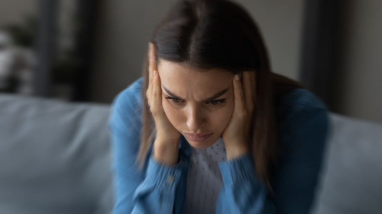 A woman is dizzy
