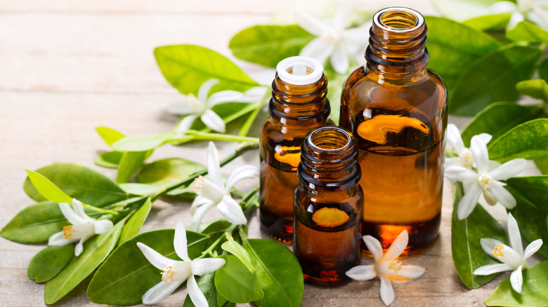 three bottles of neroli oil 