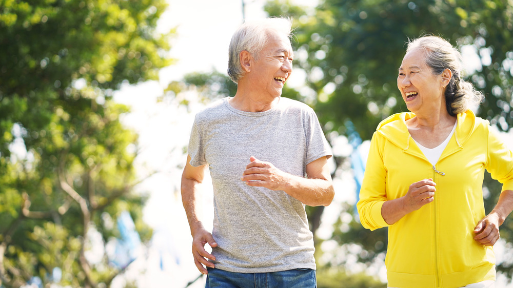 man and woman running