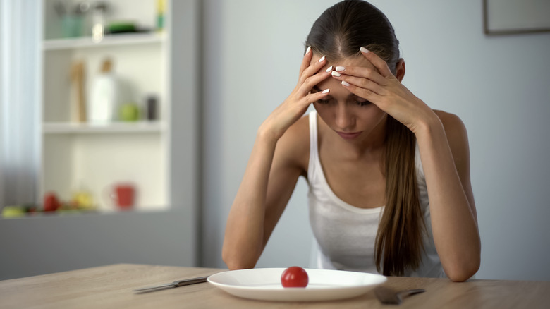 Young woman with selective eating disorder